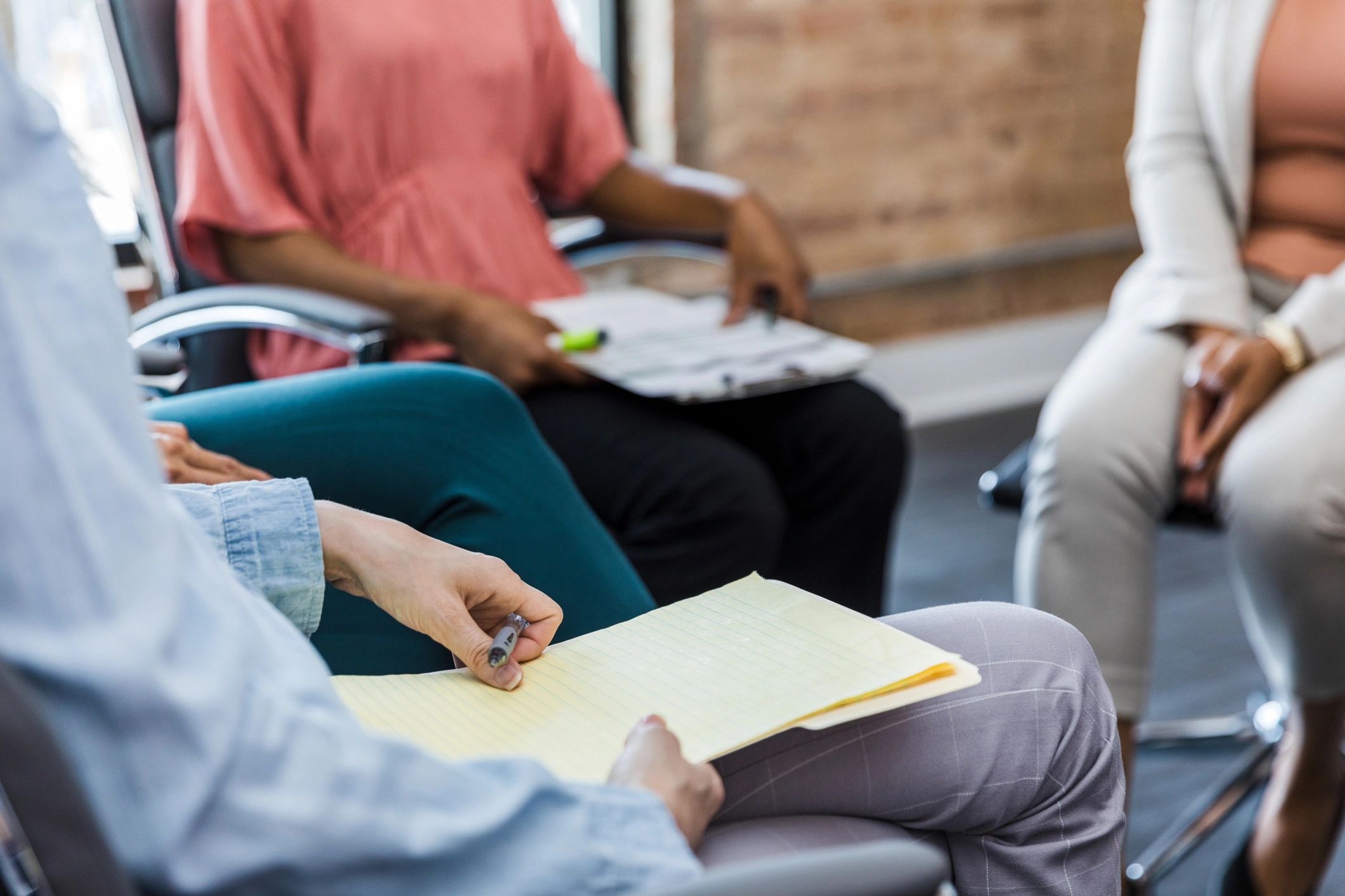 Small group seated in a circle for a workshop