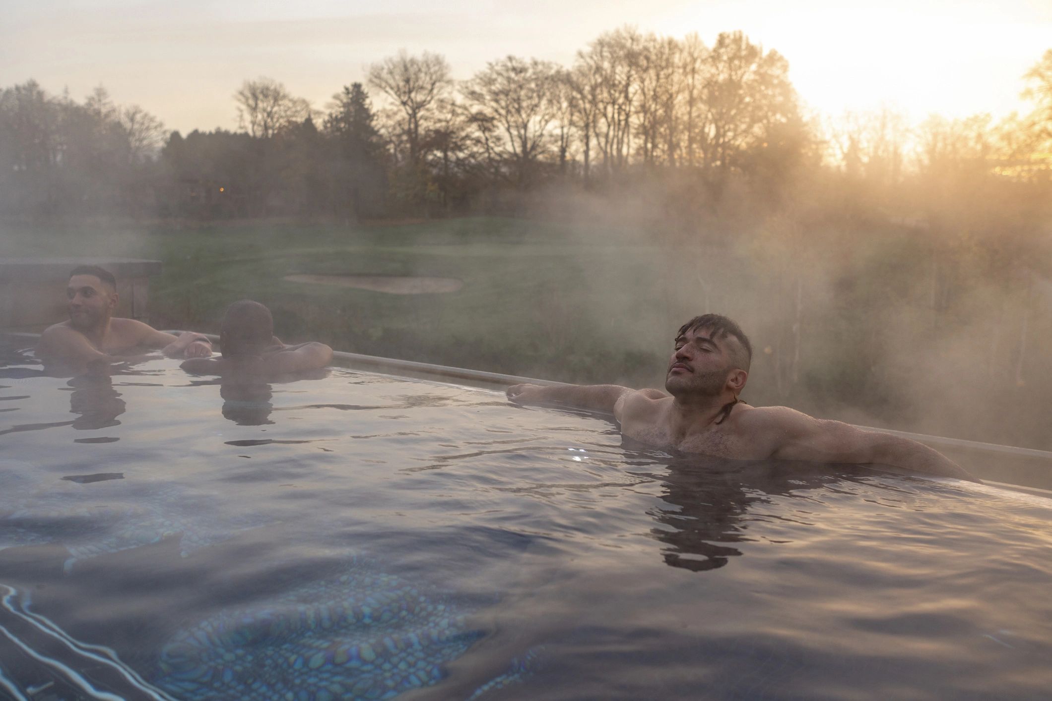 Outdoor spa pool at sunrise